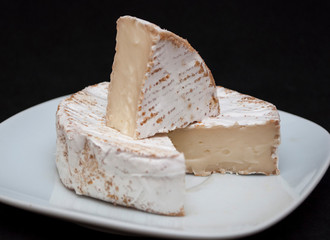 cheese on a black background