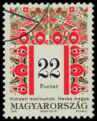 Stamp printed in Hungary shows Folk Art motives