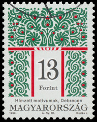 Stamp printed in Hungary shows Folk Art motives