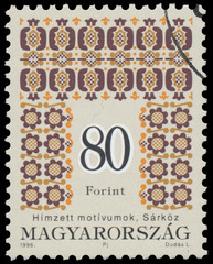 Stamp printed in Hungary shows Folk Art motives