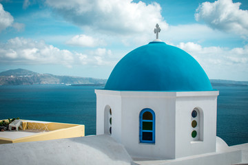 Fototapeta na wymiar Blue dome church in Oia, Santorini