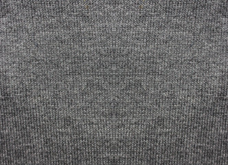Fototapeta na wymiar Grey cloth texture background. Dark gray fabric pattern, rough clothing design texture of empty woven surface