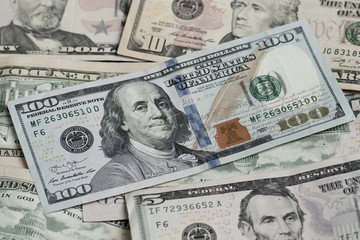 Different banknotes of american dollars