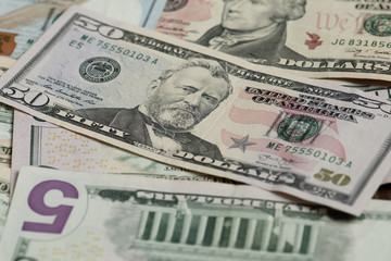 Different banknotes of american dollars