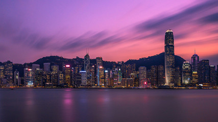 Naklejka premium Victoria Harbor of Hong Kong at twilight