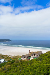 Fototapeta na wymiar View of Hout Bay Beach, Cape Town, South Africa. Vertical.