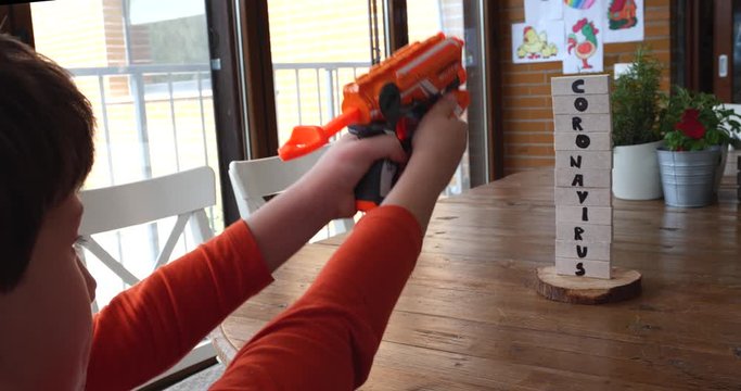 A kid is bored to staying at home and so he shoots to the Coronavirus