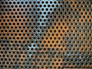 Perforated rust steel grating, stamping steel grating, laser cutting.  Background or texture.