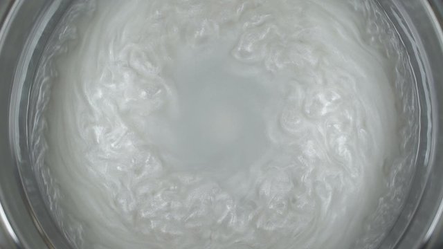 Rheoscopic fluid. Beautiful movement of particles in a liquid. Fantastic patterns and shapes. 50 fps