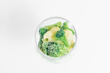 broccoli in a glass with onions