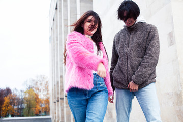 young happy students teenagers at university building on stairs, lifestyle people concept boy and girl