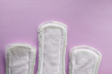 women's pads on a pink background