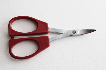 small scissors on a white background