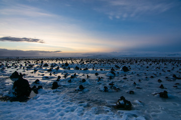 Iceland Rock Field at sunset in the winter