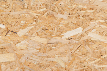Oriented Strand Board. Chipboard building material.
