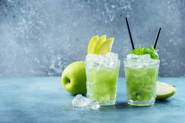 Green cocktail with ice and mint