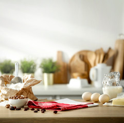 Mineral water on a wooden table in the morning sunlight with free space for an advertising product