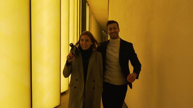 stylish couple walks around the city