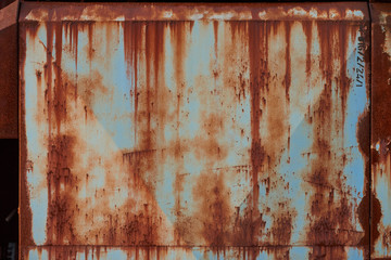 Old buildings covered with rust. Texture of old metal covered with rust background
Metal agricultural silos.