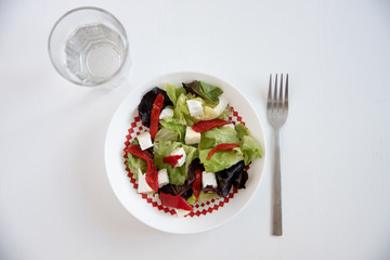 Salad, fork and glass