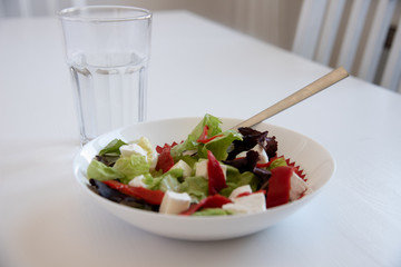 Salad, fork and glass