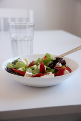 Salad, fork and glass