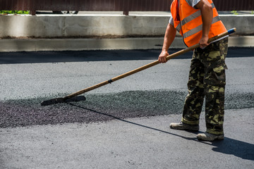 asphalt lay new workers with tools
