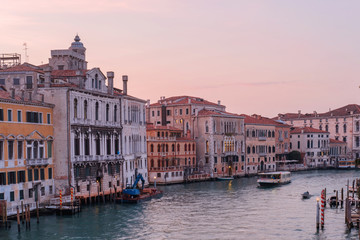Fototapeta na wymiar View of a Grand canal and facades of Venetian houses