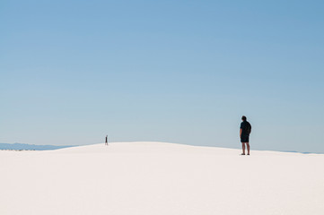 Fototapeta na wymiar a person in the white sand desert