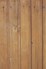 Wooden door with peeling paint and vintage handles with space for text