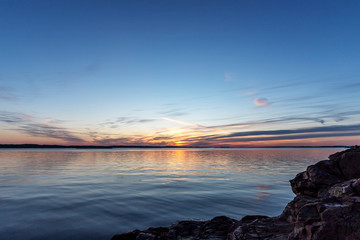 Fototapeta na wymiar Scenic view of sea against sky at sunset