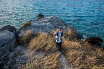 Fototapeta premium male backpacker hiking along the coast in bermuda