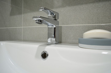 the sink in the bathroom and soap