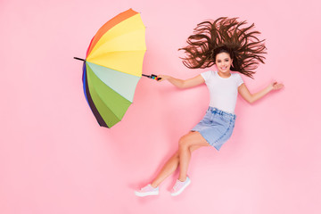 Top above high angle view full size profile side photo of positive girl lay hold umbrella fly air...