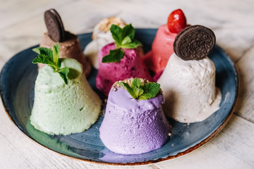 tasty handmade eco ice cream  in different colours served on a beautiful plate