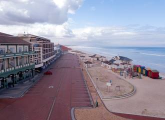 Cape Town, South Africa - 16 April 2020 : Empty streets of Cape town at Muizenberg beach, South Africa during the lock down, aerial view.