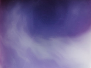 Background in blue and white tones, which looks like clouds or stains on the water