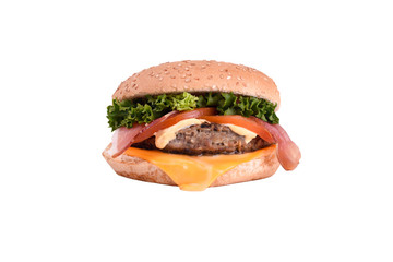 Fresh burger with pork and beef cutlet, bacon, cheddar cheese, caesar sauce isolated on white background.