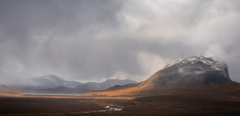 storm clouds over the mountains in the arctic