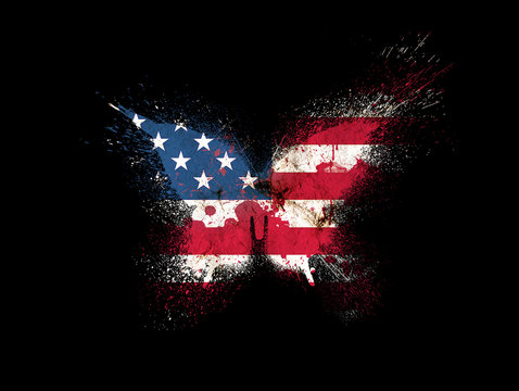 Butterfly silhouette in colors of USA national flag in grunge style with paint splatters isolated on a black background. American flag in the form of a butterfly silhouette with paint splash.