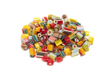 assorted bright lollipops isolated on a white background. Close up. Macro