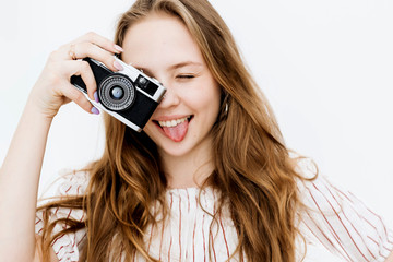 Girl with an analog camera