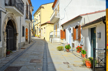 A narrow street among the picturesque houses of a mountain village