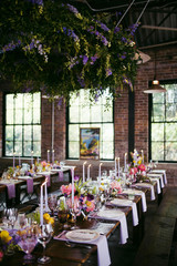 Beautiful French Inspired Wedding Dinner Table Setting with Hanging Florals