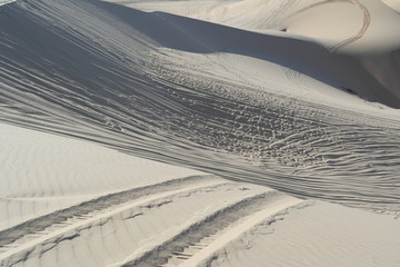 The White Sand Dunes of Mui Ne. Desert with traces of ATVs