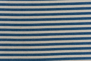 Nautical textile texture for background. Close up of a marine textile texture with blue and white...
