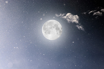 Photo of the cosmic sky with luminous stars and a large moon. Background. Texture of the starry sky. Space. A supermoon. Full moon. Observation of the cosmos.
