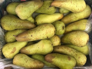 yellow pears in a market