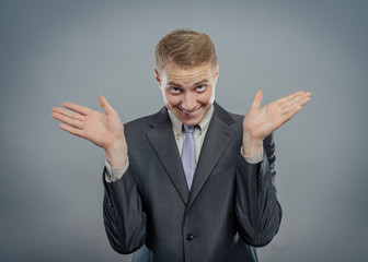 excited man in shirt with both arms outstretched toward camera - isolated on white