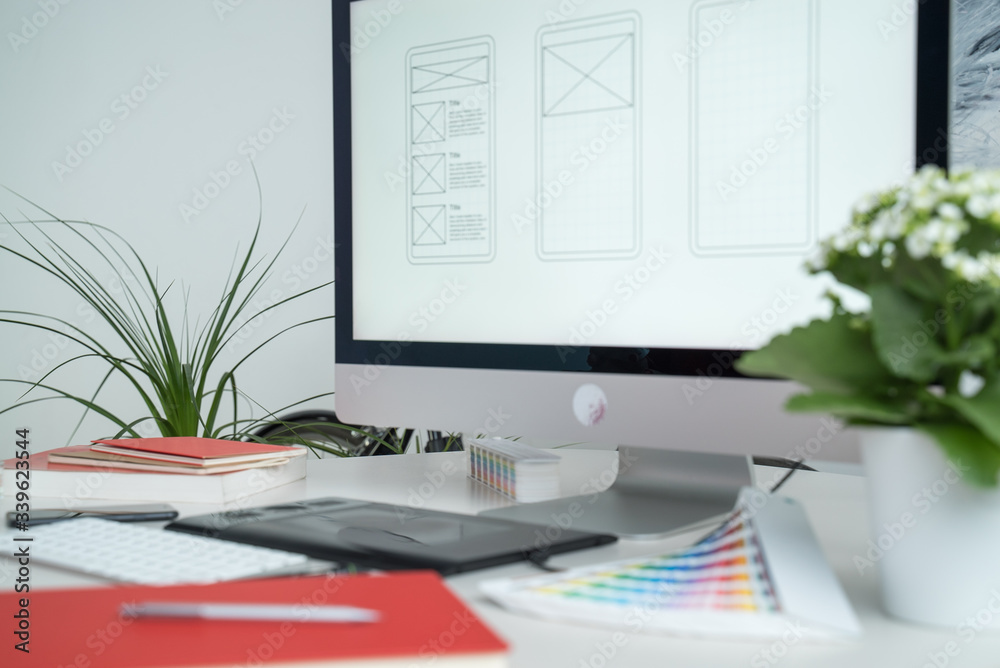 Wall mural web designer at work. graphic designer. mobile application design. designer desktop. ux, ui design. 
